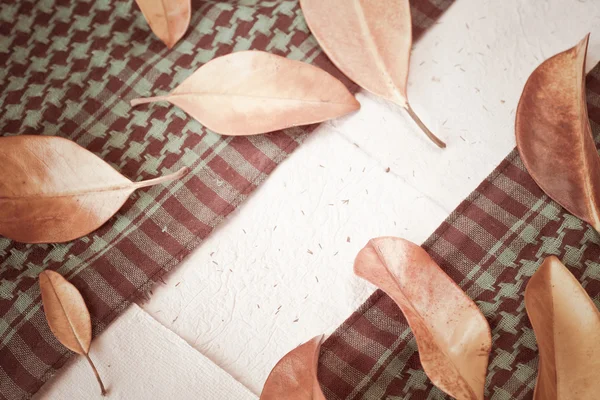 Brown leaves on the table — Stock Photo, Image