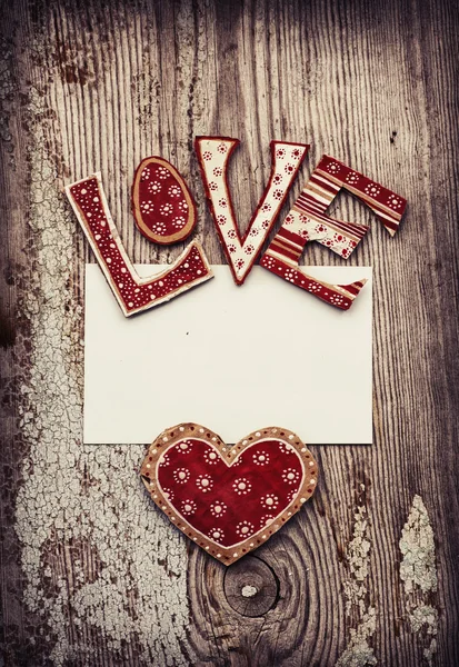 Liebeshintergrund mit Herz, leeter Liebe und Papier — Stockfoto