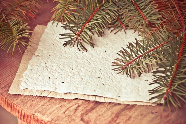 Pine tree branches with paper — Stock Photo, Image