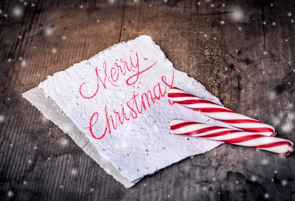 Baston şekerler ile Noel kartı — Stok fotoğraf