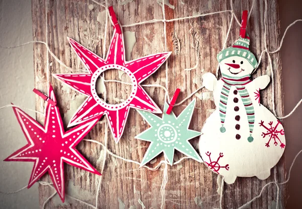 Χριστούγεννα αστέρια διακόσμηση και χιονάνθρωπος — Φωτογραφία Αρχείου