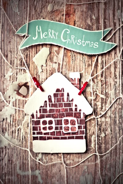 Veselé vánoční pozdrav zpráva a chléb house — Stock fotografie