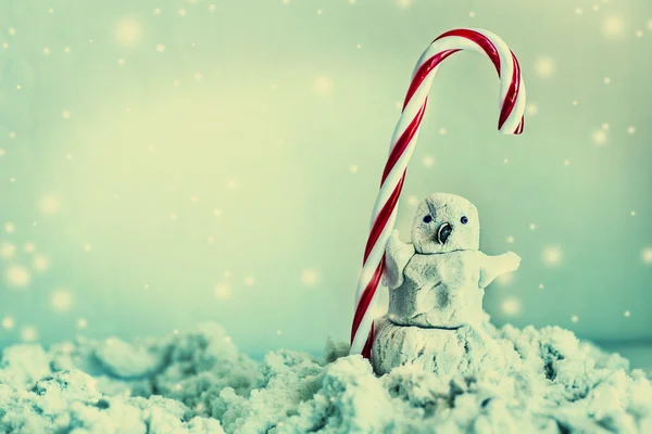Boneco de neve com cana de doces — Fotografia de Stock