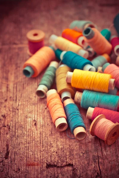 Bobbins with colorful threads — Stock Photo, Image