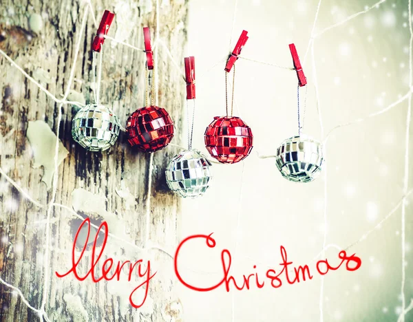 Silver, red balls and Merry Christmas sign — Stock Photo, Image