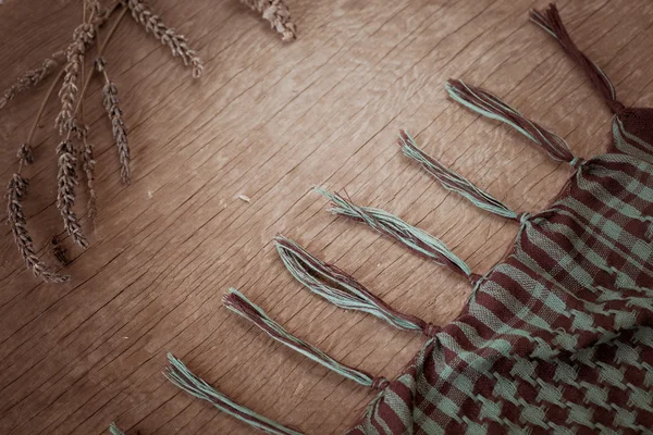 Фон с клетчатым шарфом — стоковое фото