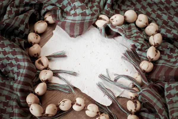 Background with beads and scarf — Stock Photo, Image