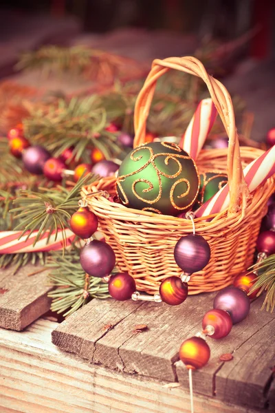 Christmas background with candies, green balls — Stock Photo, Image