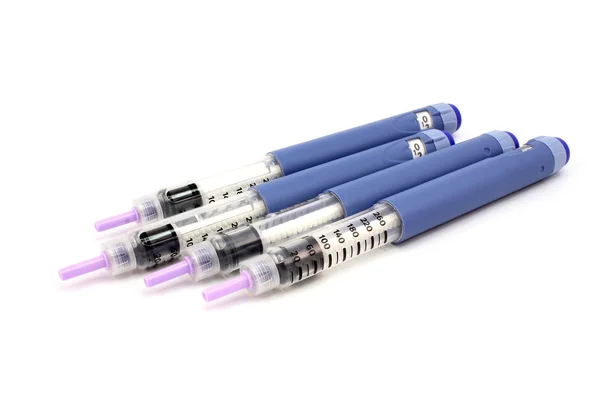 Four syringe with insulin pen — Stock Photo, Image