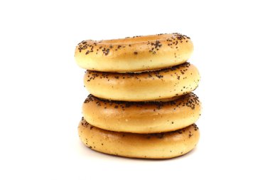Several poppy bagels stacked clipart