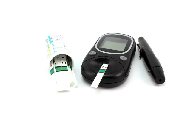 Glucometer test strips en lancet — Stockfoto