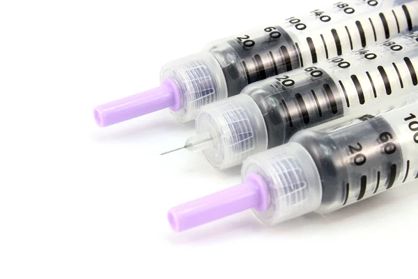 Три шприца инсулиновой ручки — стоковое фото