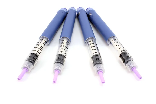 Four syringe pen full face — Stock Photo, Image