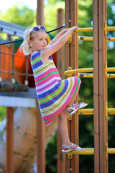 Little girl having fun at playground — Stock Photo, Image