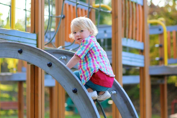 Toddler girl having fun at playground — Stock Photo, Image