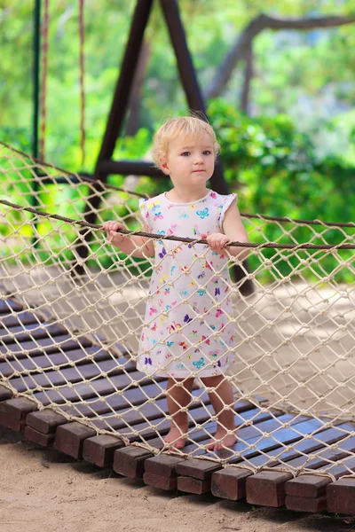 Menina criança no parque infantil — Fotografia de Stock