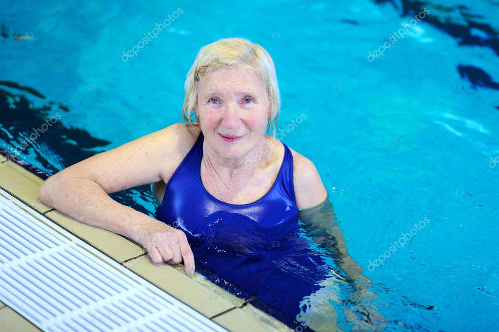 Active senior woman swimming in the pool Stock Photo by ©CroMary 63253003