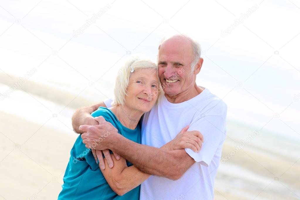 Happy elders on the beach