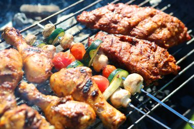 Delicious griller meat with vegetables clipart