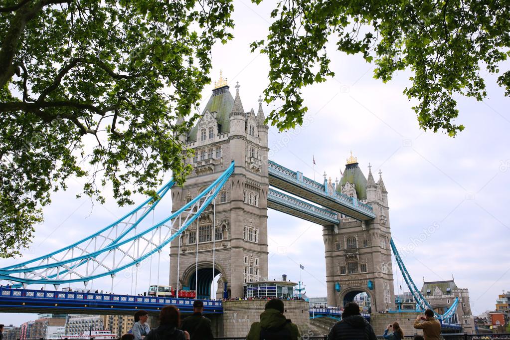 Tourists enjoying view of Tower Bridge, London