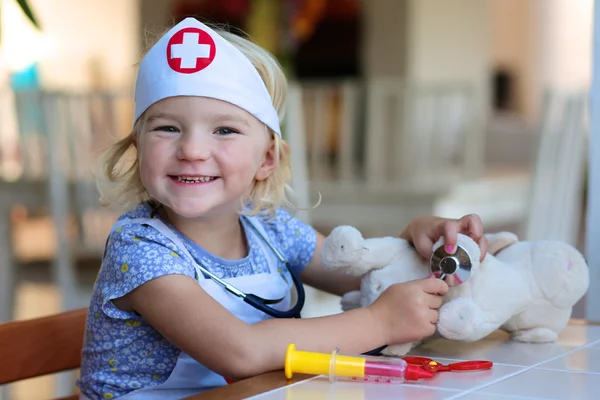 Girl playing doctor role — Stock Photo, Image