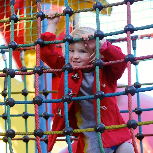 Happy toddler having fun at playground — Stock Photo, Image