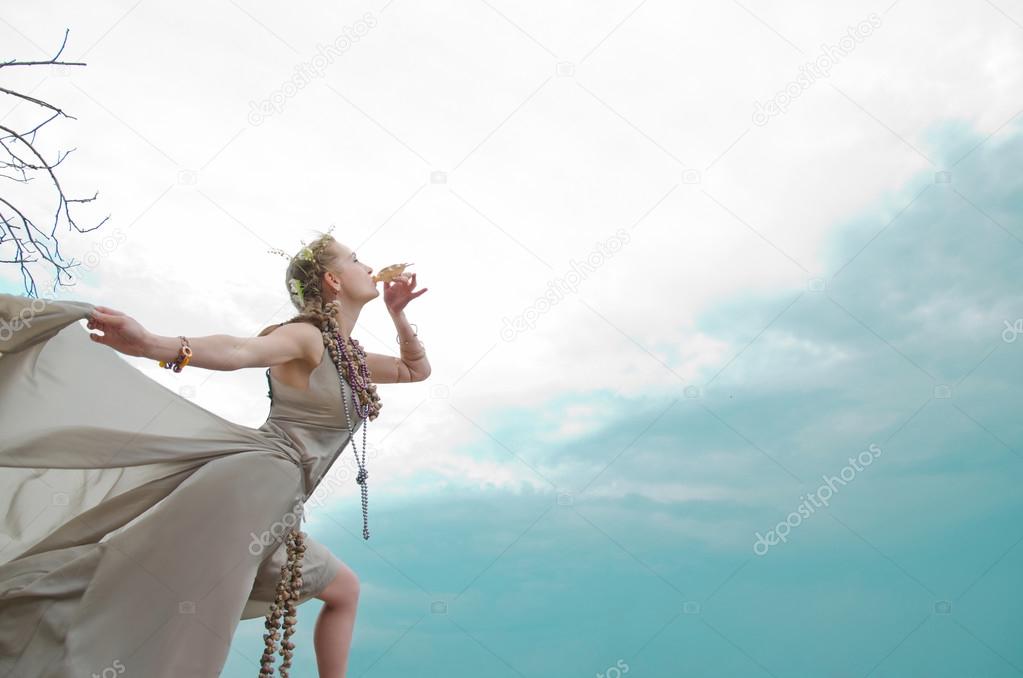 girl blowing into sink