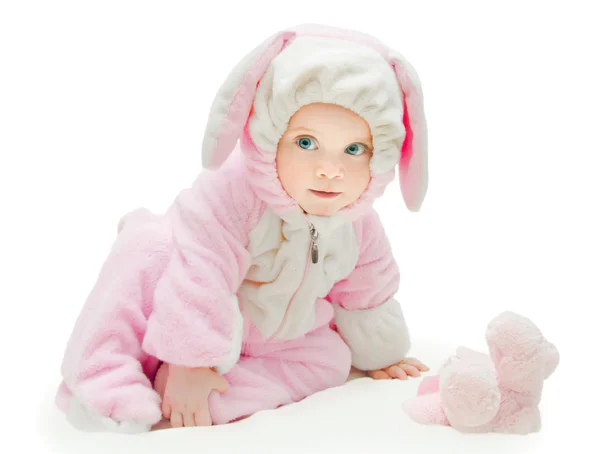 Niña en un traje de conejo rosa —  Fotos de Stock