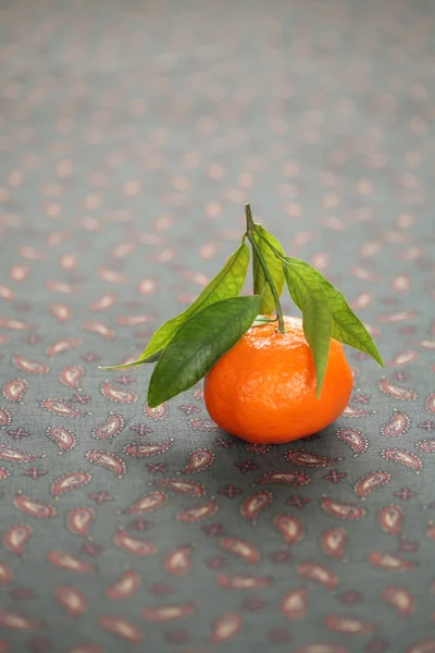 Fresh Tangerine on a dark tablecloth — Stock Photo, Image