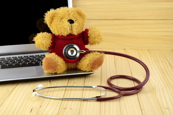 Teddy Bear and Stethoscope in Children Clinic Concept. — Stock Photo, Image