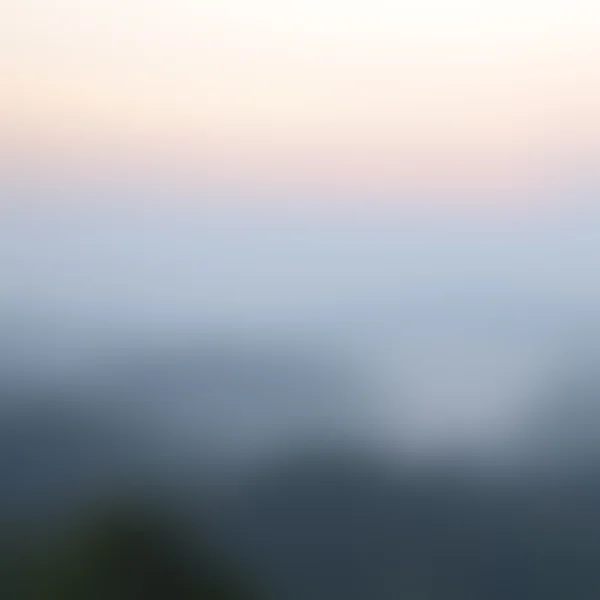 Luz da manhã cedo, Fundo borrado do nascer do sol, os fenômenos de iluminação natural . — Fotografia de Stock