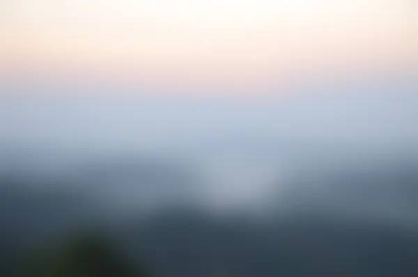 Luz da manhã cedo, Fundo borrado do nascer do sol, os fenômenos de iluminação natural . — Fotografia de Stock