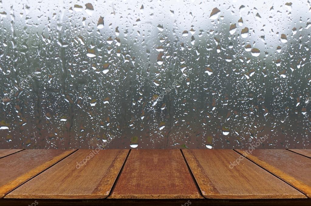 Rain Drops On Glass Window Background With Wood Table Stock Photo By C Areeya Rain Drops On Glass Window Background With Wood Table Stock Photo By C Areeya