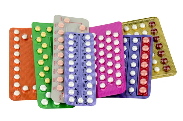 Colorful oral contraceptive pill strips isolated on white backgr — Stock Photo, Image