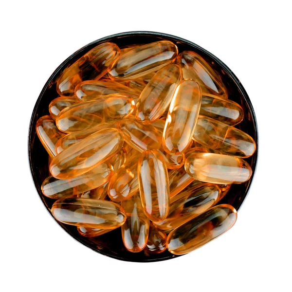 Különböző színű lágy zselatin kapszula gyógyszer a fehér háttérb — Stock Fotó