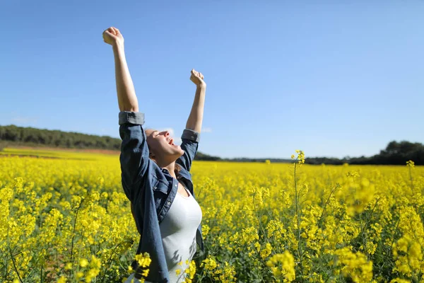 Excited Female Raising Arms Screaming Air Celebrating Spring Field — Stockfoto