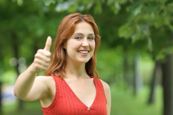 Happy Woman Gesturing Thumbs Looking Camera Park — Stock Photo, Image