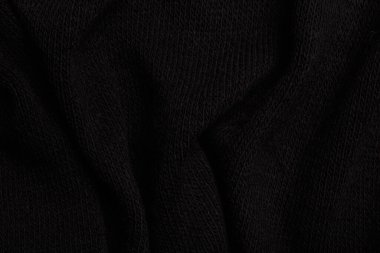 Kırışık siyah örgü kumaş dokusu, arkaplan veya arkaplan. 