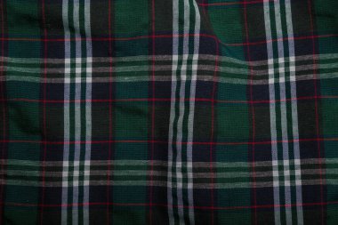 Damalı yeşil gömlek kumaş dokusu. Kumaş yüzeyi.