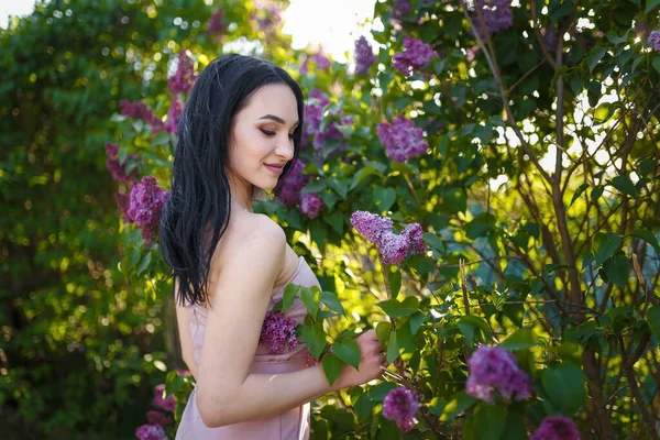 Young Pretty Girl Tender Touching Lilac Flowers Blossoming Bush Springtime — Stock Photo, Image