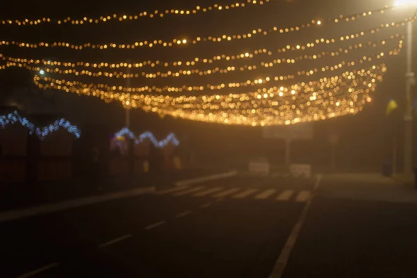 Fotografia Noturna Desfocada Luzes Grinalda Natal Bokeh Cidade Feliz Ano — Fotografia de Stock