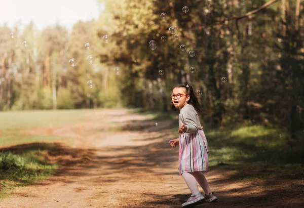 Little Funny Girl Plays Soap Bubbles Nature Summer — Stock Photo, Image