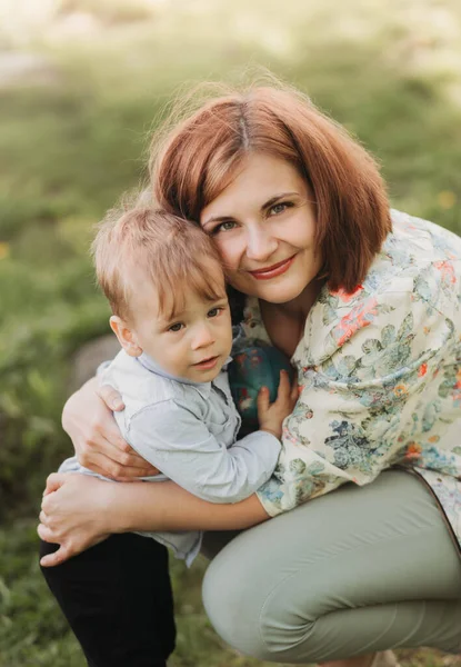 Young Mother Gently Hugs Her Son Todler Park Sunny Day — Stock Photo, Image