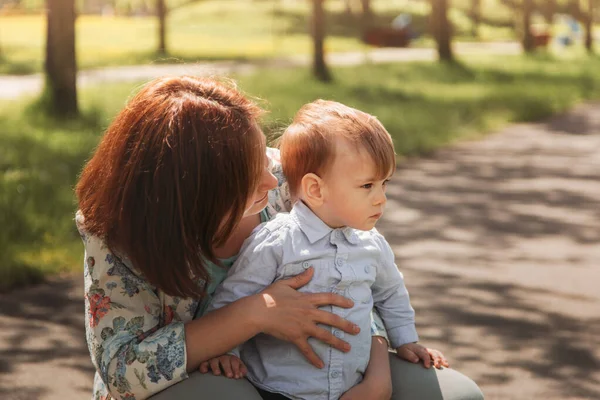 Young Mother Gently Hugs Her Son Todler Park Sunny Day — Stock Photo, Image