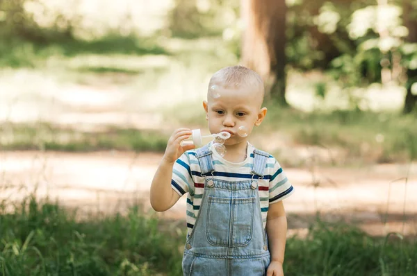Little Boy Inflating Soap Bubbles Summer Nature — Stock Photo, Image