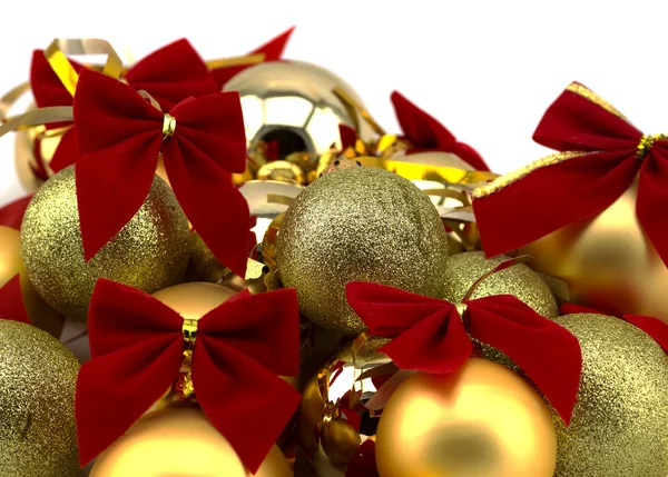 Christmas golden balls with red ribbons on a white background — Stock Photo, Image