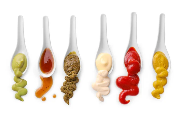 Set Sauces Spilling Spoons Isolated White Background Top View — Stock Photo, Image