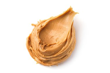 Beyaz arka planda izole edilmiş kremalı fıstık ezmesi. Üst görünüm.