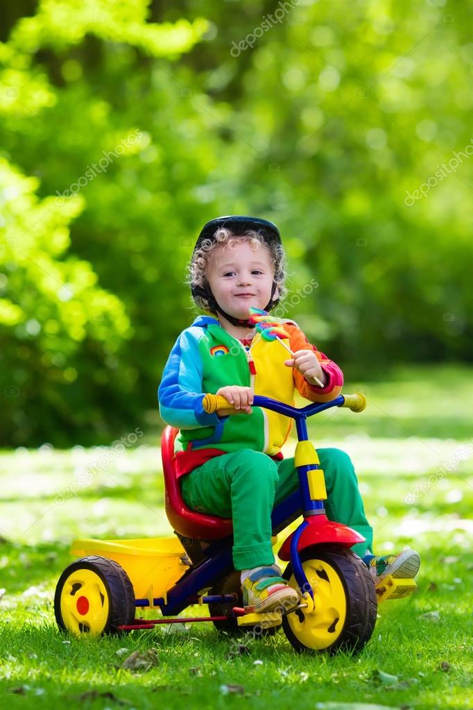 little boy tricycle