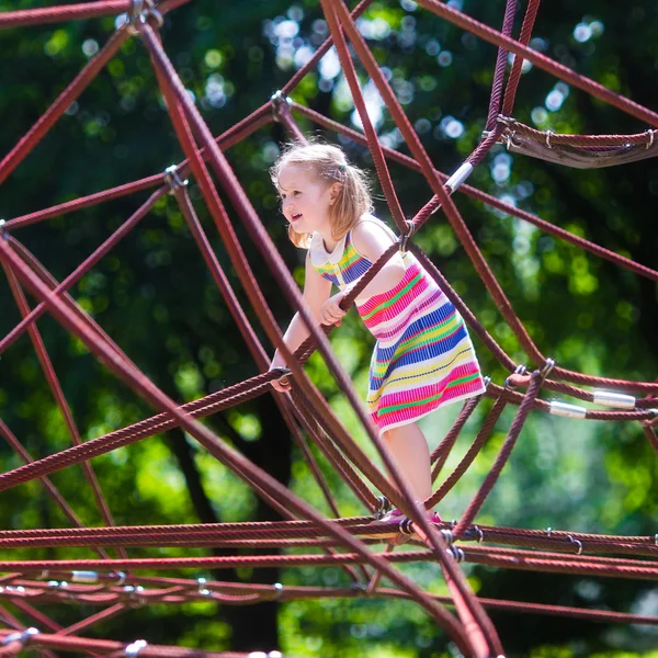 Child having fun on school yard playground — Stock Photo, Image
